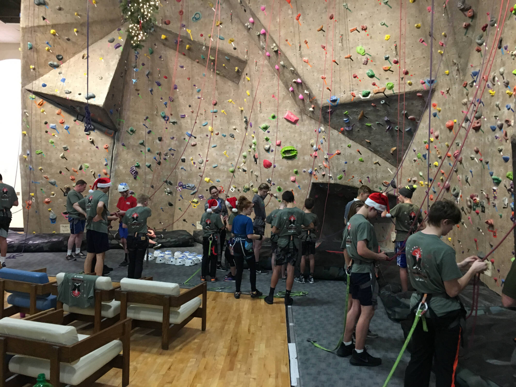 Group of scouts visiting the climbing center for a holiday climb experience